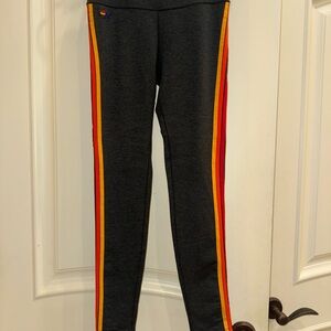 Gray Leggings with Red and Yellow Stripes